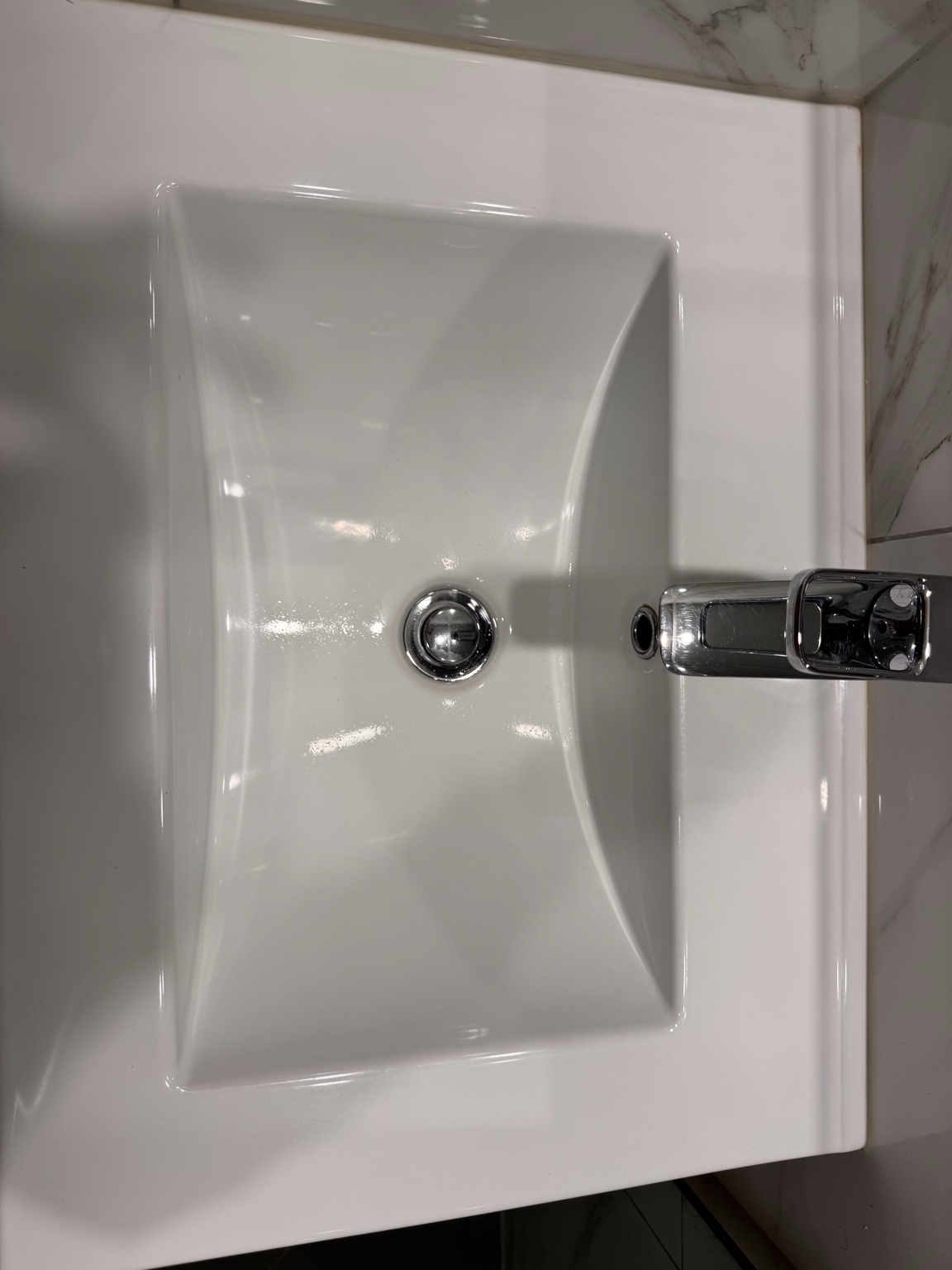 Clean polished bathroom basin after cleaning by UrbanShine in Auckland