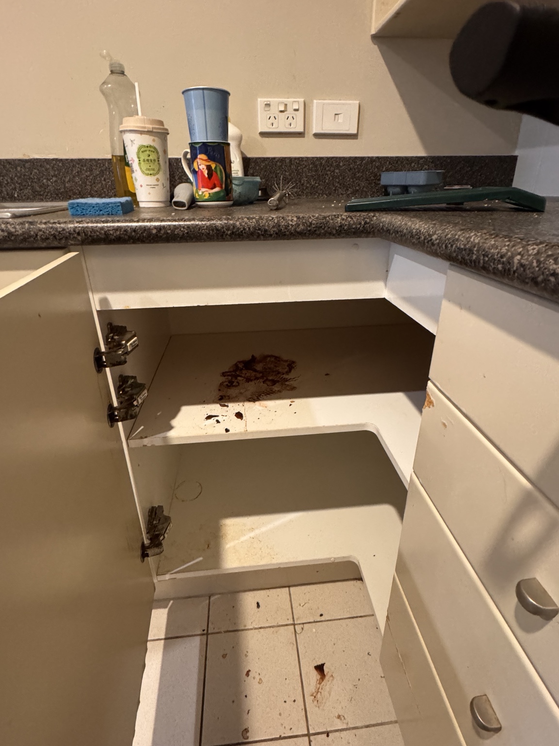 Kitchen cabinet with spills and debris before cleaning by UrbanShine